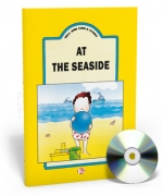 Tell and Sing a Story - At the Seaside + CD audio Tell and Sing a Story - At the Seaside + CD audio